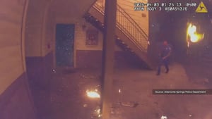 Body camera video shows officers rush to help during deadly apartment fire