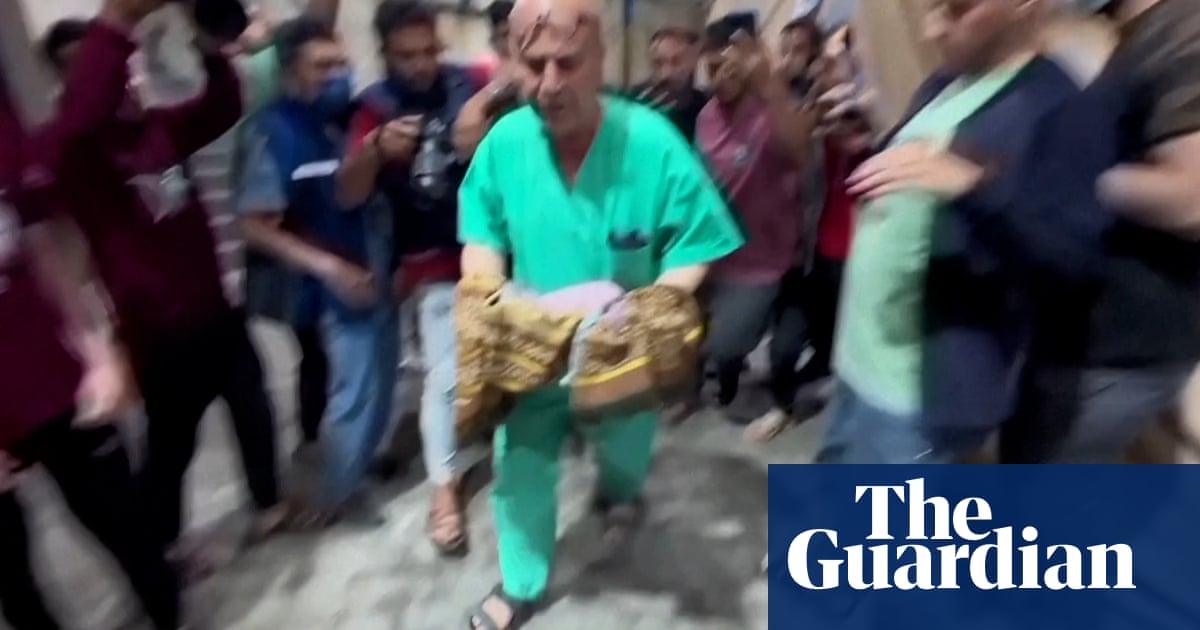 Gaza medics pull baby from womb of mother killed in Israeli airstrike video | World news