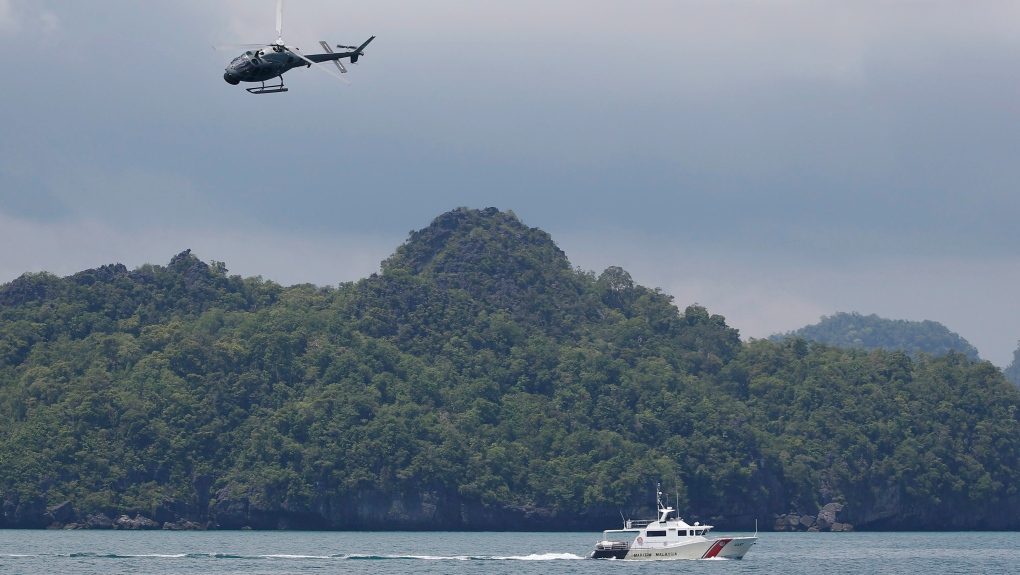 Malaysian military helicopters collide while training, killing 10 [Video]