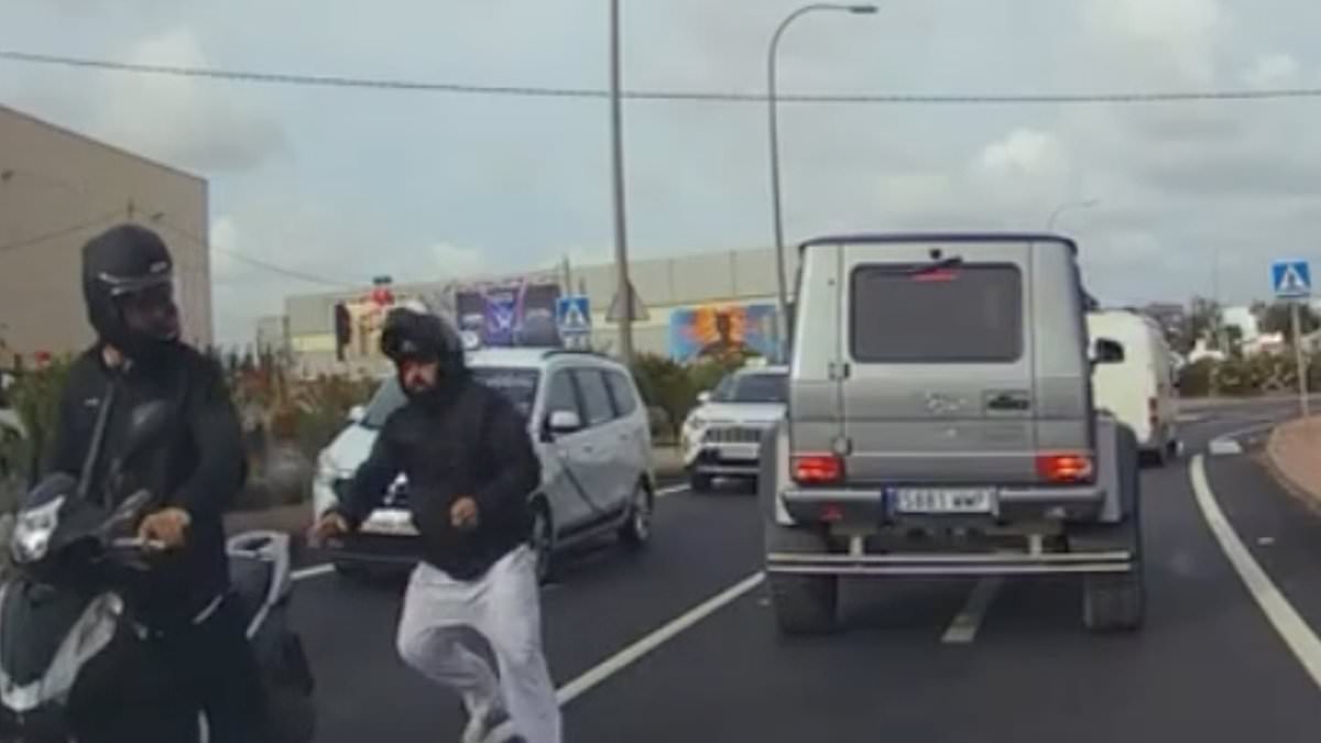 Why you should ALWAYS watch out! Dramatic moment two moped muggers snatch driver’s timepiece off his wrist while stuck in traffic at roundabout near Ibiza airport [Video]