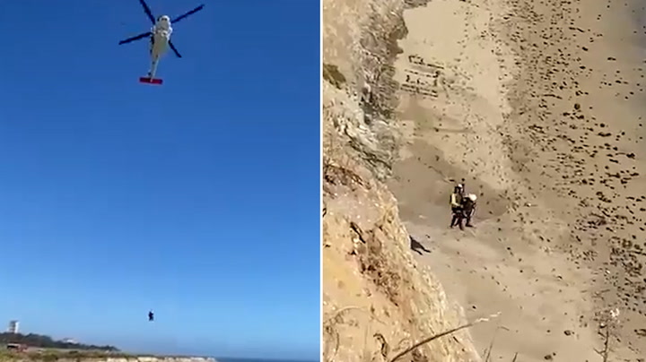 Kite surfer rescued from beach after spelling message with rocks | News [Video]