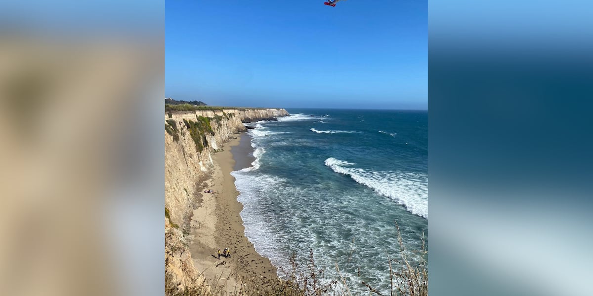 Stranded kite surfer rescued after spelling Help with rocks on beach [Video]