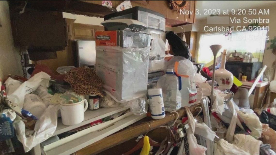 Carlsbad neighbors try to help woman inside hoarder home [Video]