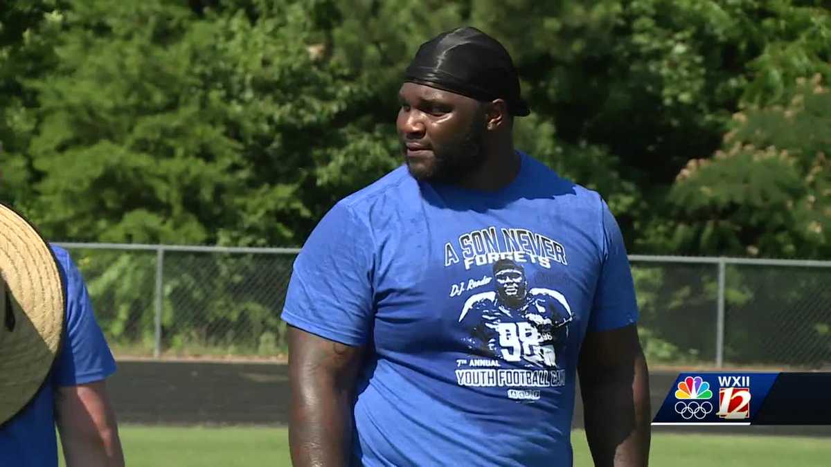 NFL player returns to hometown of Greensboro to hold annual youth football camp [Video]
