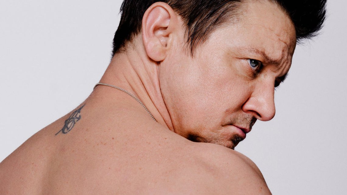 Jeremy Renner Poses Shirtless for Magazine Cover, Shows Scars From Snow Plow Accident [Video]