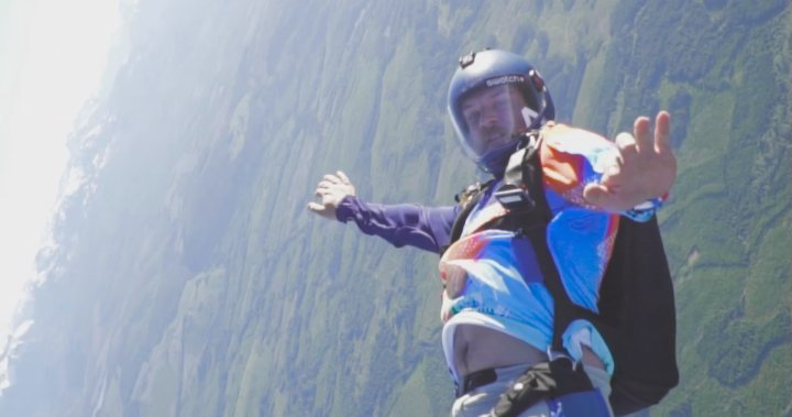 A skydiving accident left him a double amputee. Now hes a snowboarding champion [Video]