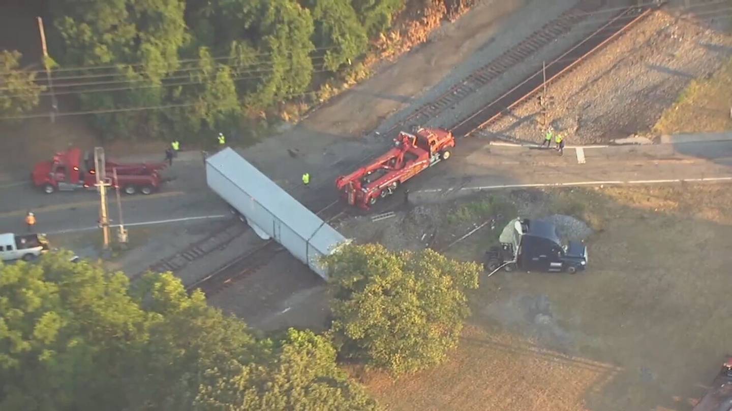 Tractor-trailer hauling cherries hit by train in Henry County  WSB-TV Channel 2 [Video]