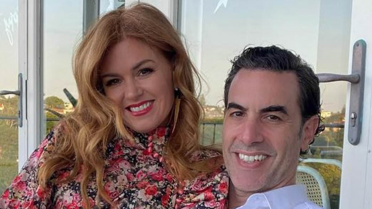 Isla Fisher delivers pointed message to ex Sacha Baron Cohen as she enjoys Robbie Williams concert in London [Video]