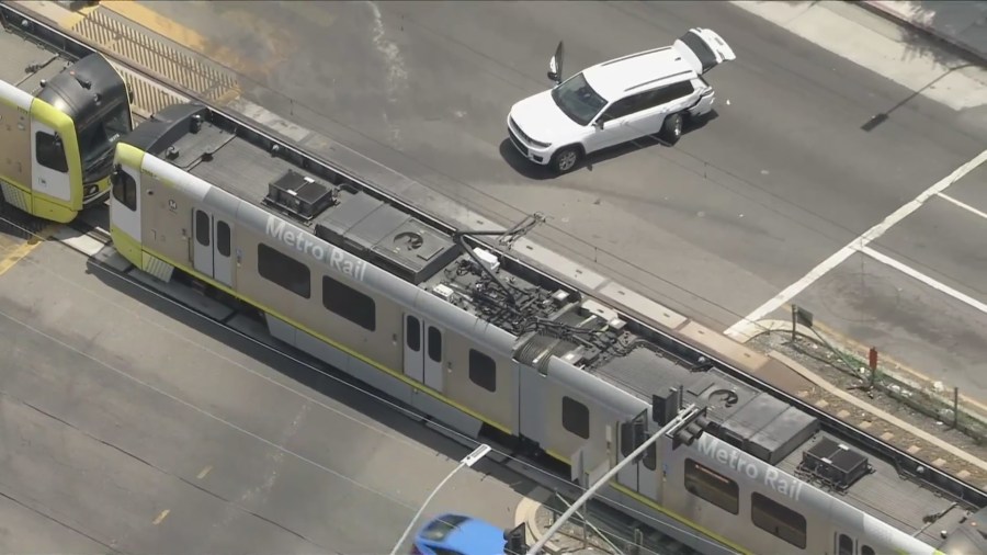 Train, vehicle collide in Expo Park [Video]